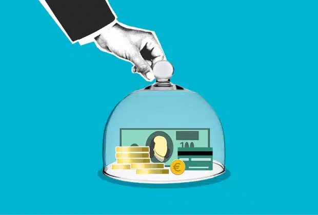 Decorative cardboard illustration of person hand putting transparent dome on dollar banknotes and coins on blue background